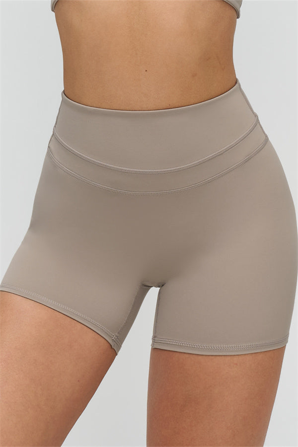 Conjunto deportivo Stride de top y shorts